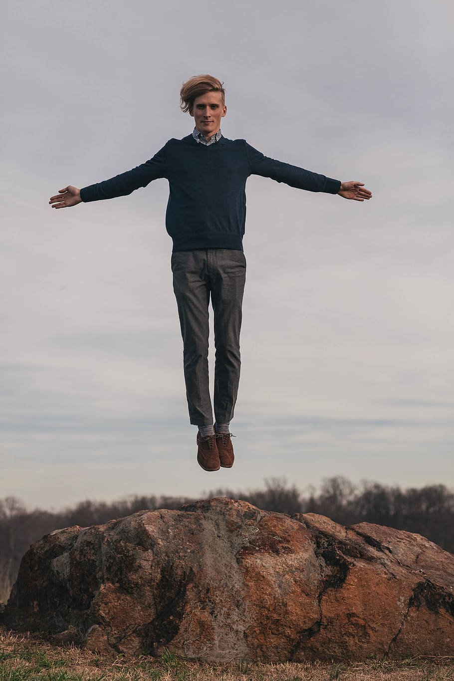 jump shot photography man in long sleeves shirt and gray pants HD wallpaper