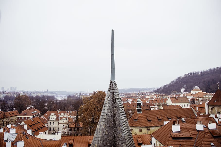 photo of brown building roof, bird's-eye view photography of concrete tower near concrete houses HD wallpaper