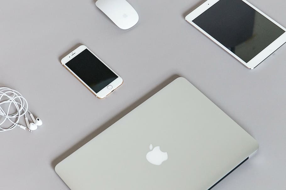 four Apple brad products on gray surface, gold, iphone, magic, HD wallpaper