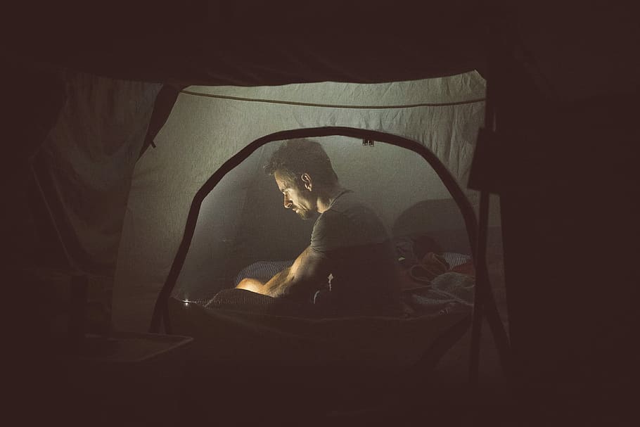 Robert Downey Jr., man sitting in tent at nighttime, camping, HD wallpaper