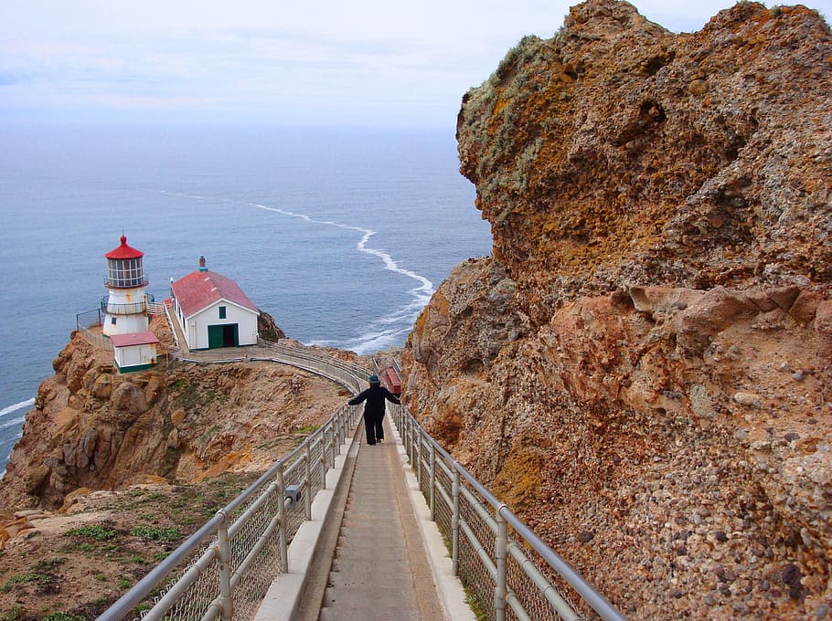 person walking down on stairs toward lighthouse, point reyes, HD wallpaper