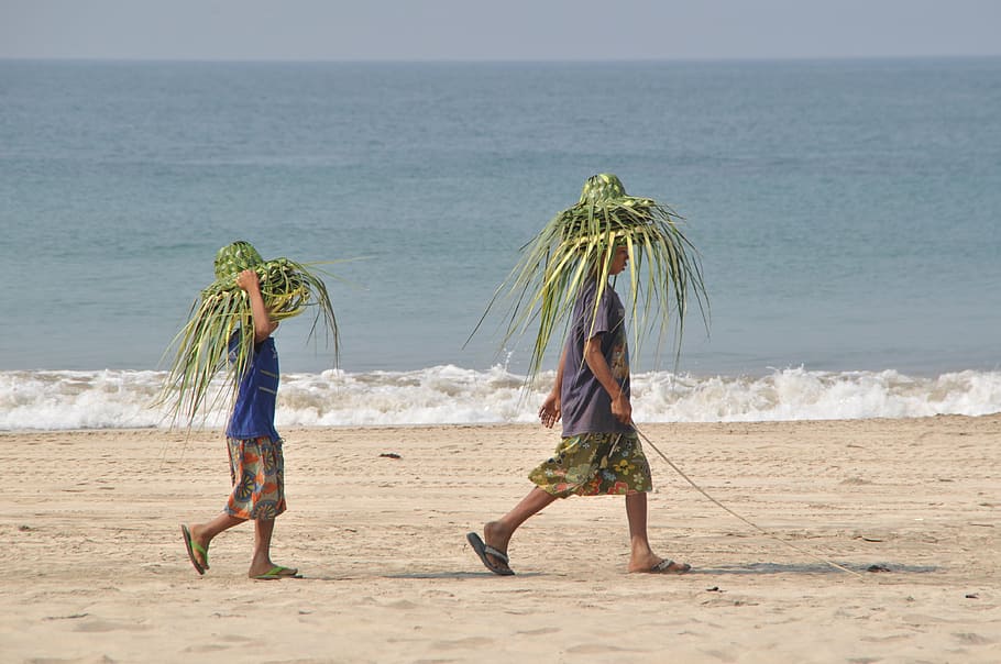 two boys walking on sand near seashore during daytime, beach HD wallpaper