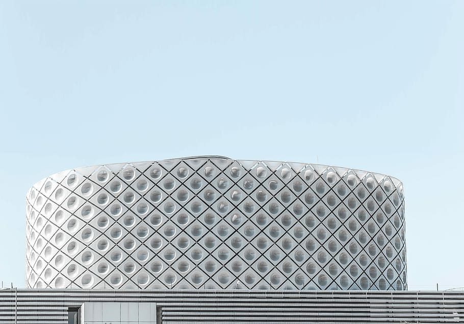 photo of white building, round gray concrete building under clear sky HD wallpaper
