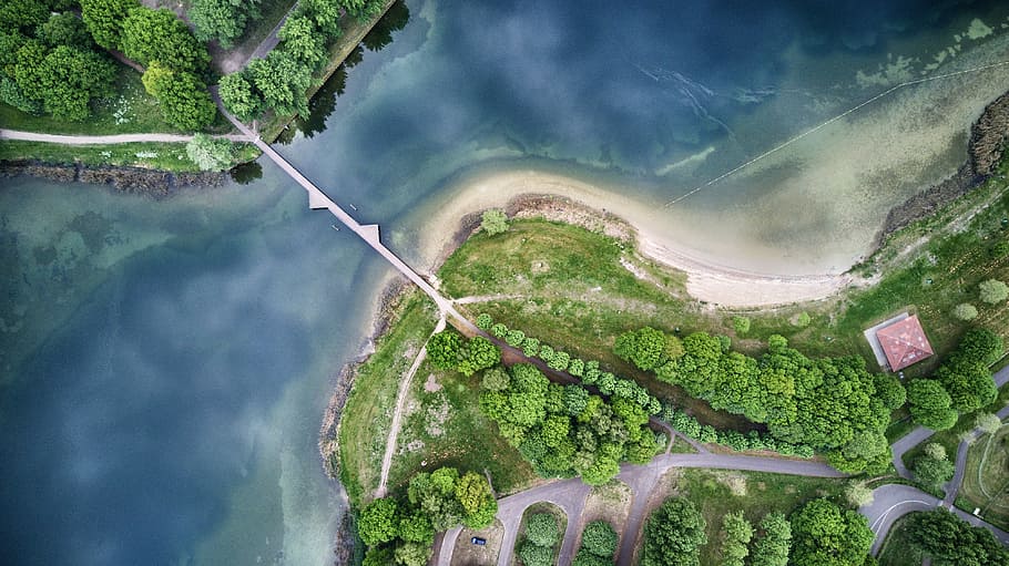 aerial photography of body of water with bridge and trees, aerial photography of bridge over river near forest HD wallpaper