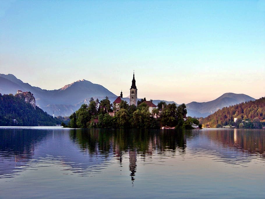 tower surrounded by water during daytime, Lake Bled, Slovenia