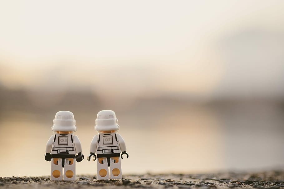 selective focus photography of two white Lego minifigures, two LEGO toys macro photography, HD wallpaper