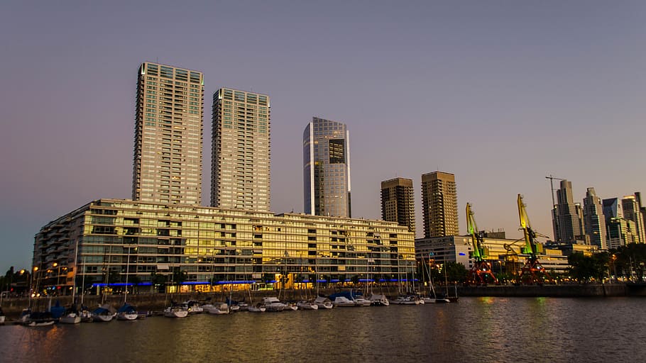 high-rise buildings surrounded by rippling body of water, Puerto Madero