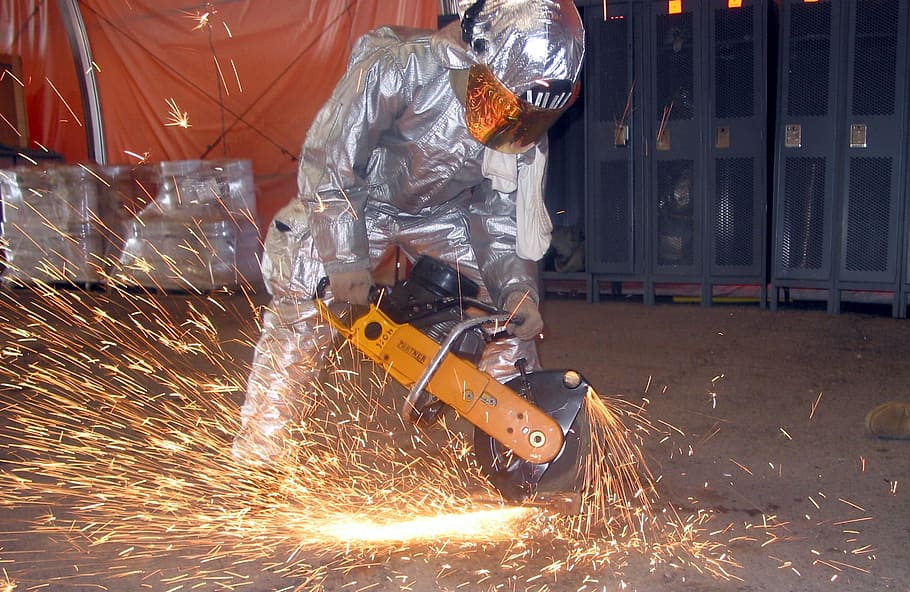person holding concrete saw, construction, worker, metal, job HD wallpaper