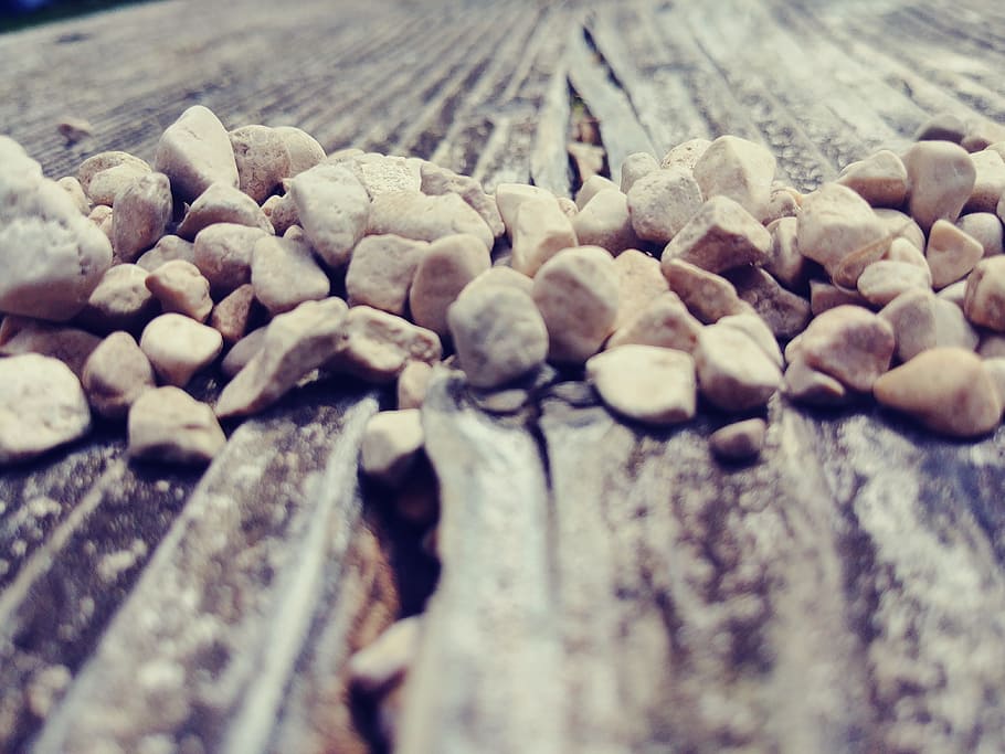 Pile of Beige Stone on Brown Wood Surface, blur, blurred, close-up HD wallpaper