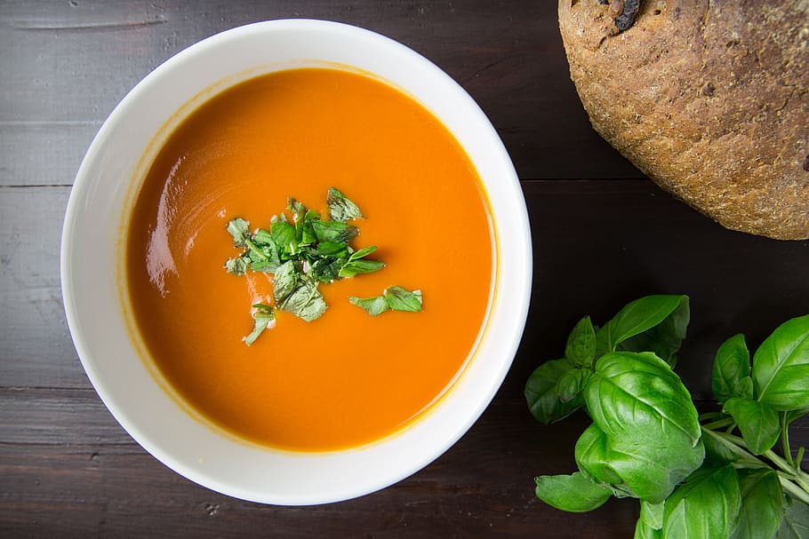 Bowl of tomato soup with basil and walnut bread, food/Drink, healthy
