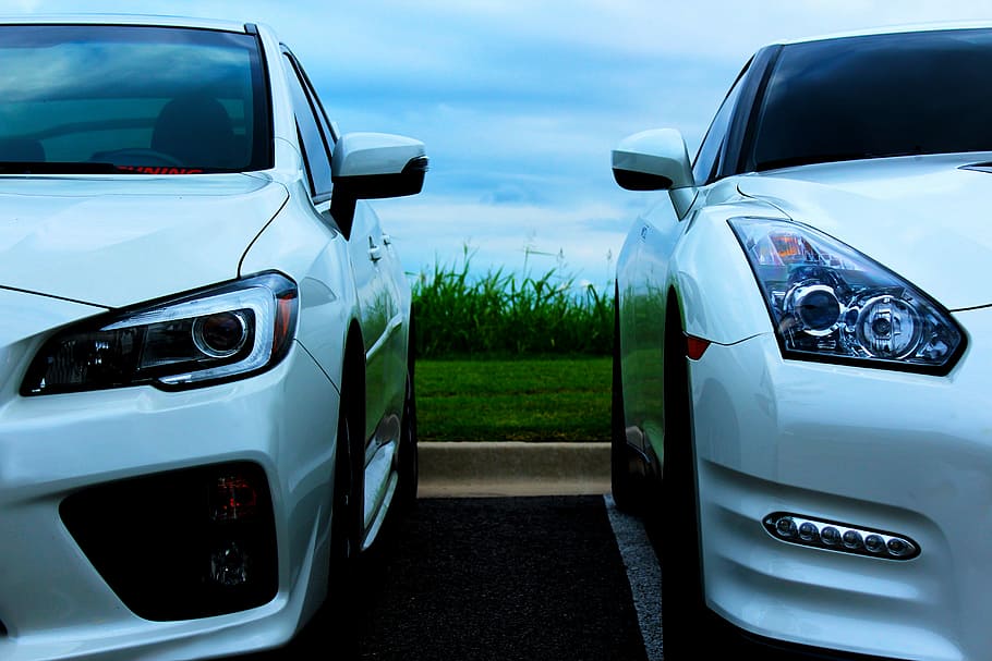 White Sports Cars Moore, two closeup photos of white vehicles HD wallpaper
