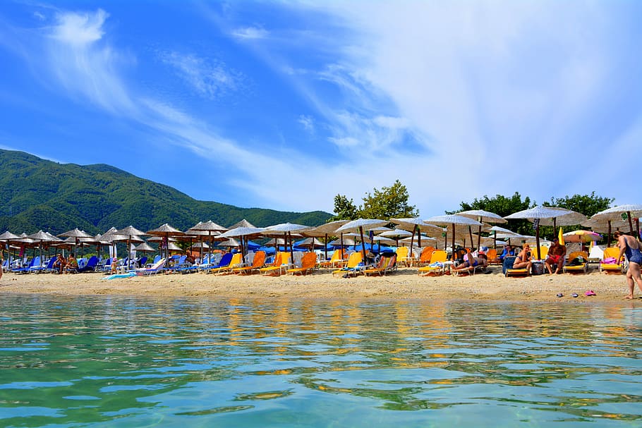 Greece beach, brown patio umbrellas on beach, summer, sunbathe HD wallpaper