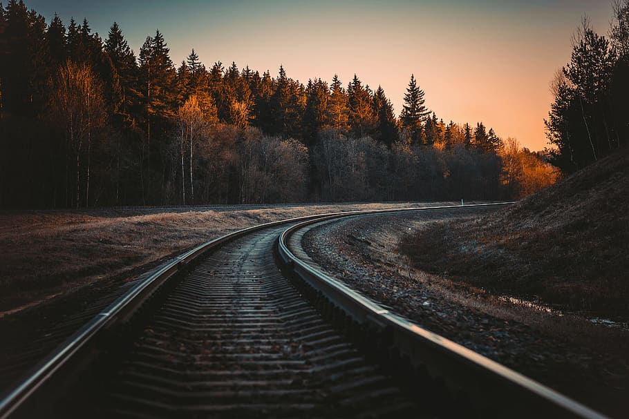 Train Rail during Golden Hour, backlit, curve, dark, dawn, dusk HD wallpaper