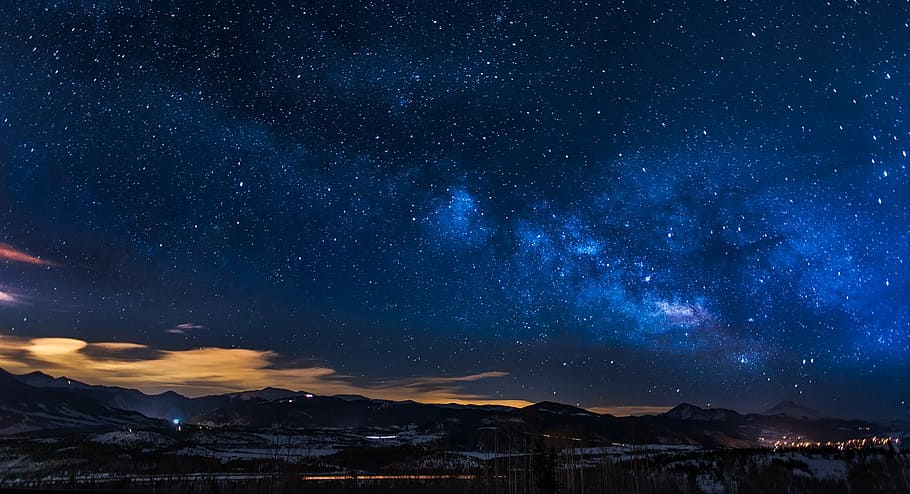 silhouette of mountains under blue sky during night time, colorado