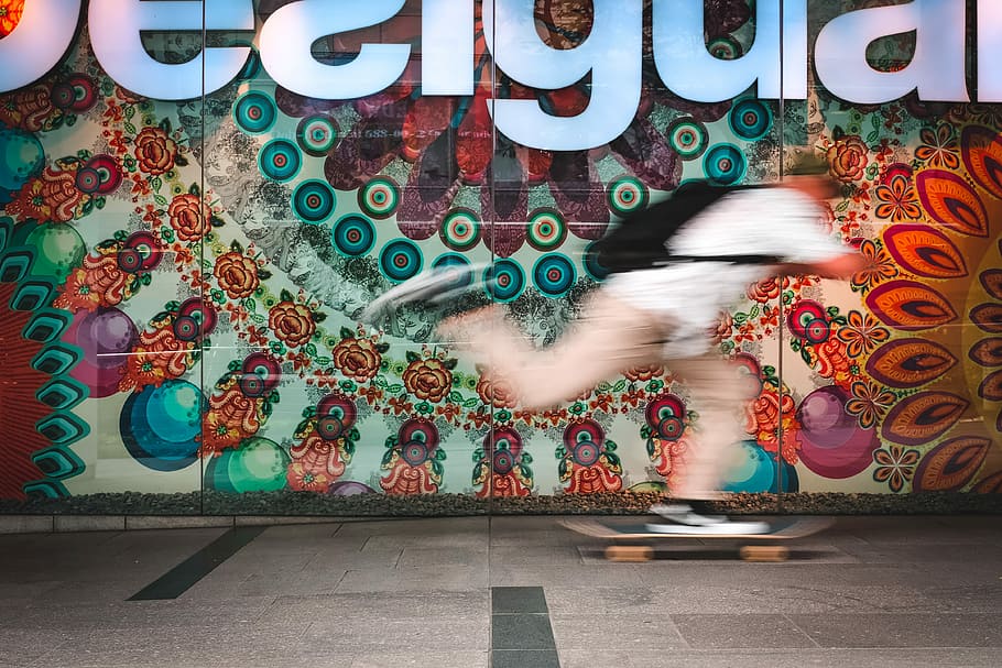 man skating near multicolored concrete wall, man playing skateboard near wall, HD wallpaper
