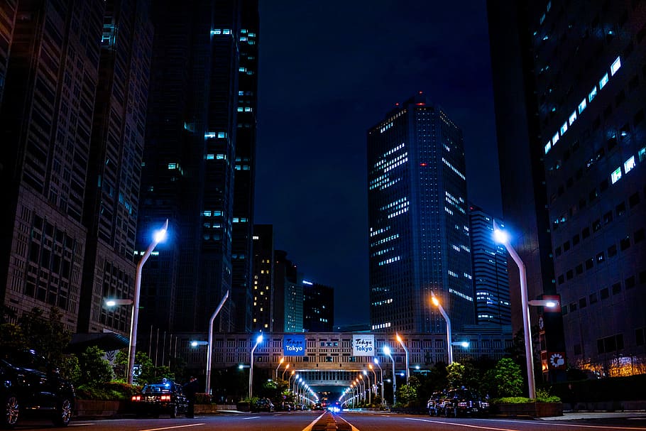 cityscapes during nighttime, opened road along buildings, street, HD wallpaper