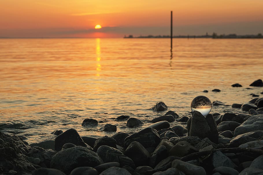 sunset, sea, beach, coast, lake constance, lindau, glass ball HD wallpaper