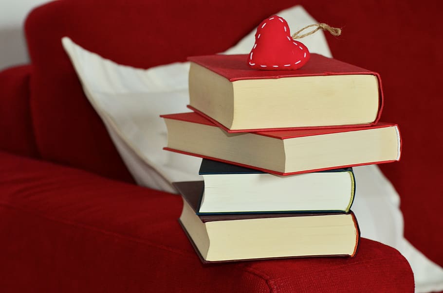 stack of books on red couch, read, book stack, literature, pages HD wallpaper