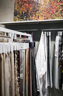 Collection of design fabrics on hangers, material, cloth, clothing HD wallpaper