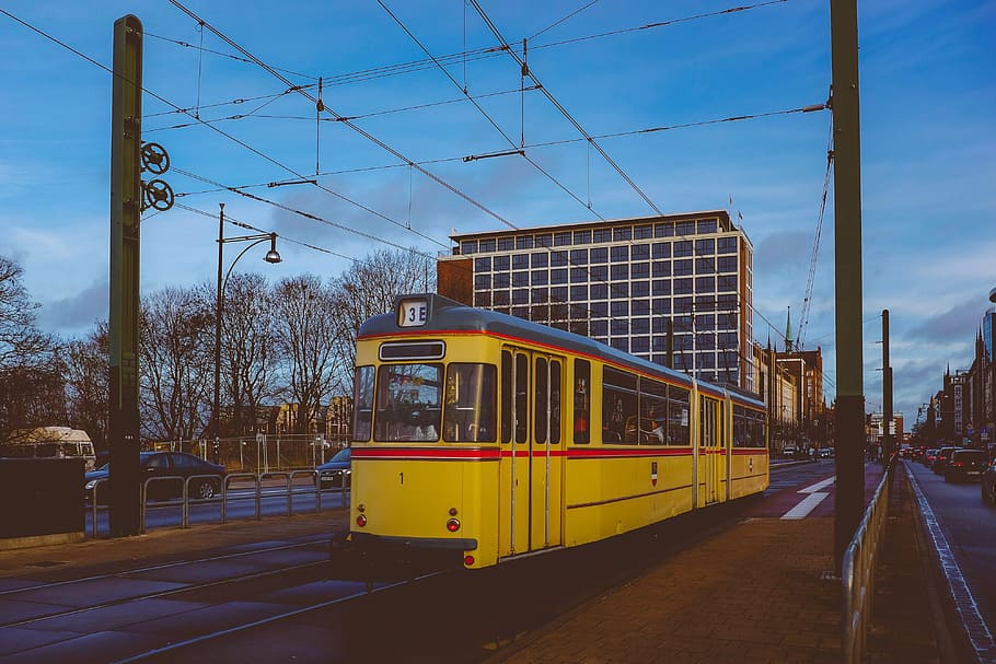 Yellow tram in Rostock, architecture and Cityscape, cable Car HD wallpaper