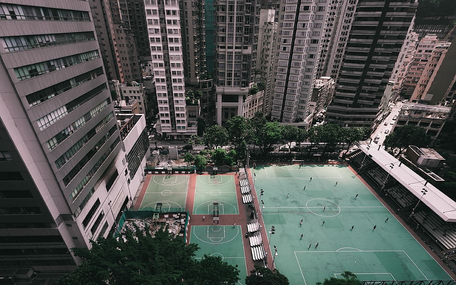The Game Hong Kong, aerial view photography of soccer field surround buildings HD wallpaper