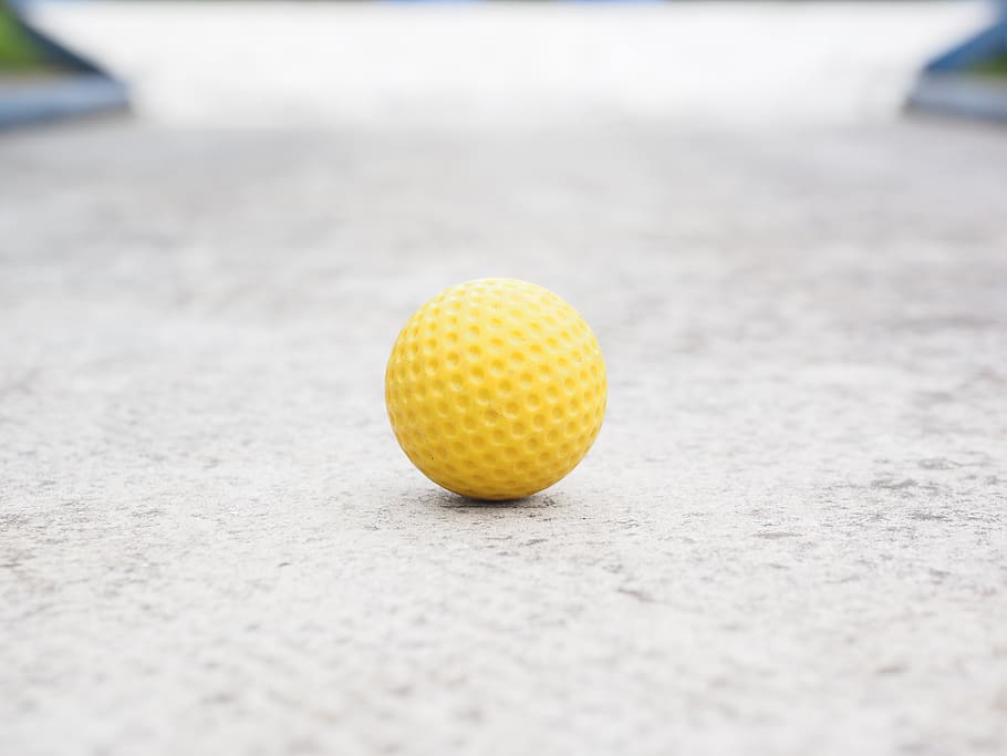 ball, mini golf ball, yellow, checkered, ball guide, miniature golf
