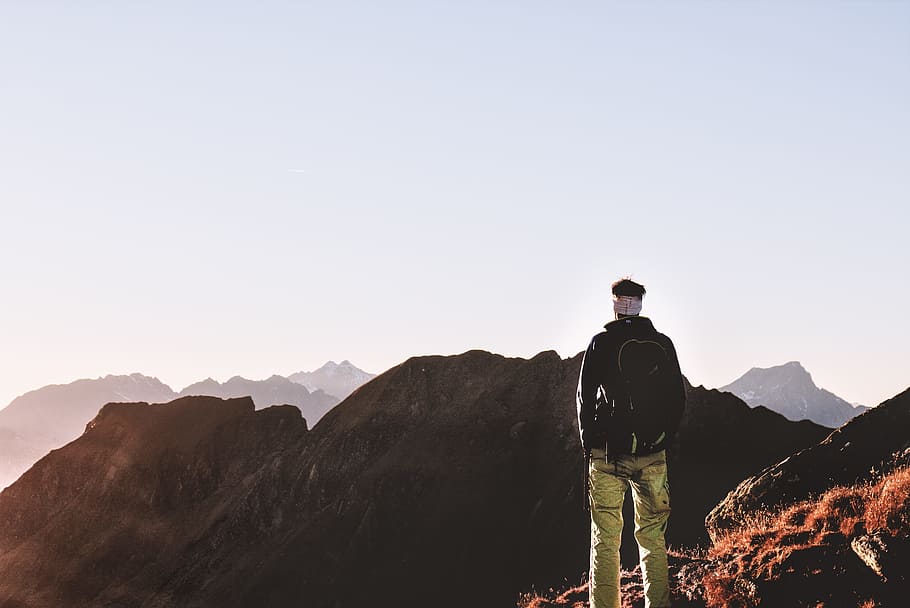 Person Standing on Top of the Mountain, backpack, climber, clouds HD wallpaper