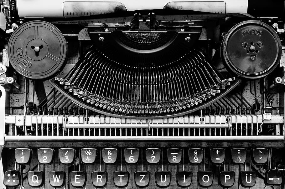 close up photo of black type writer machine, typewriter, black white