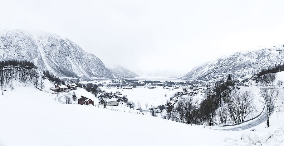 village coated with snow, snow capped mountain at daytime, norway HD wallpaper