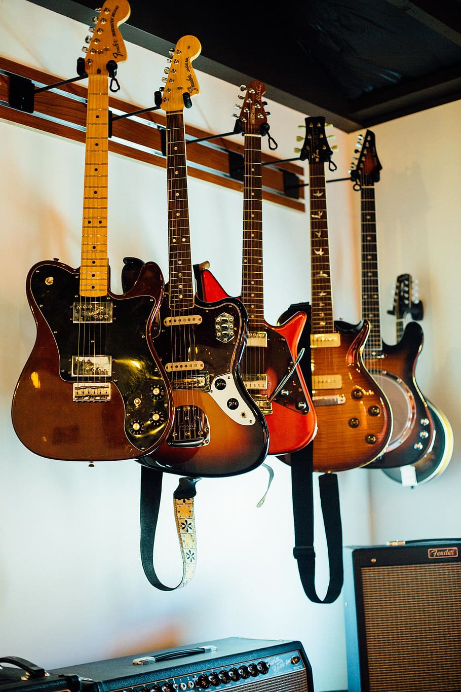Electric guitars hanging on wall, music, musical Instrument, string Instrument HD wallpaper