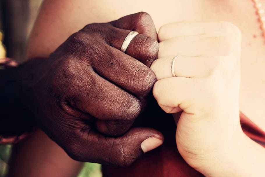 man and woman wearing silver-colored rings, couple, marriage