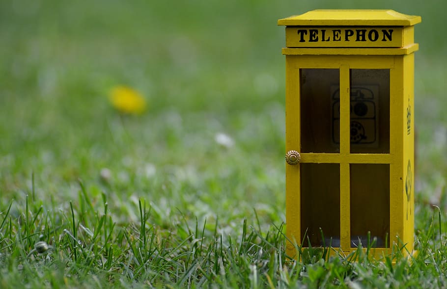 yellow telephone booth on green grass, call, communication HD wallpaper