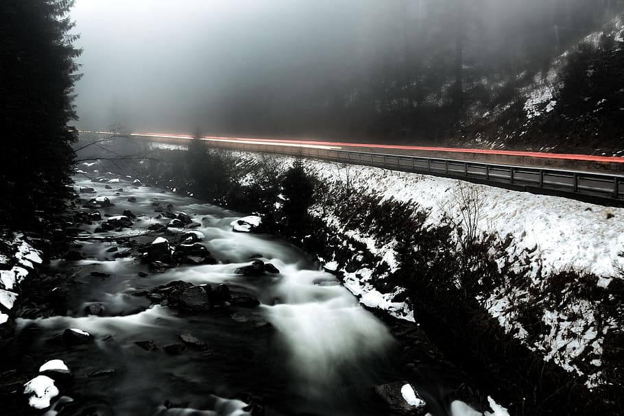 Time Lapse Photo of River Beside Highway during Cloudy Weather HD wallpaper