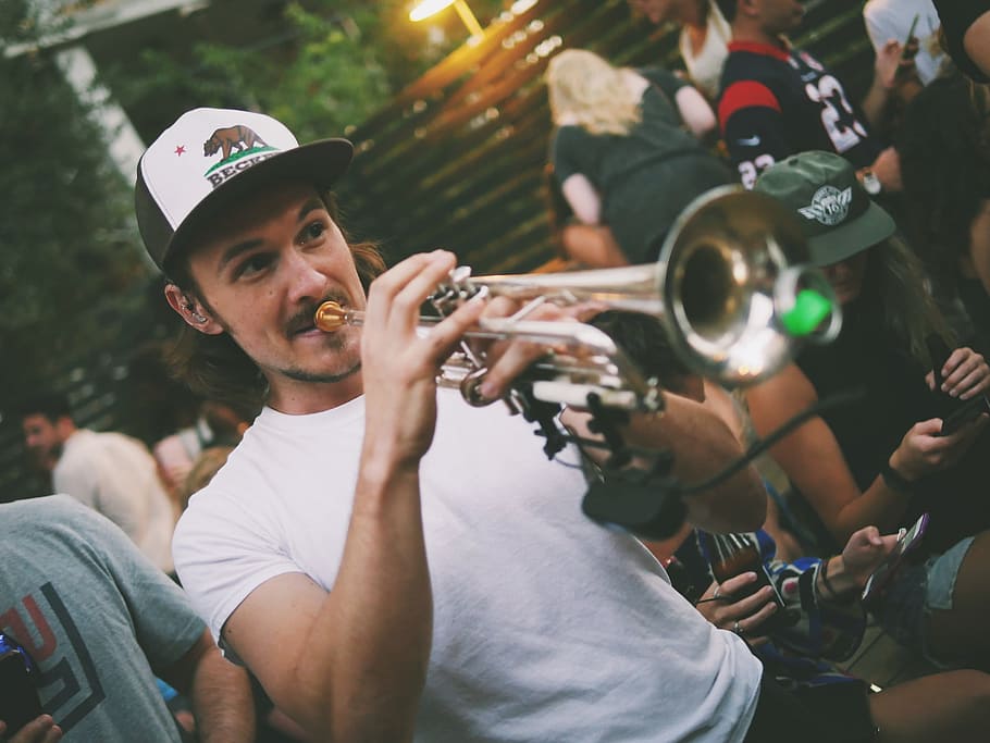 Live Music in Austin, TX, man playing trumpet, jam session, caucasian
