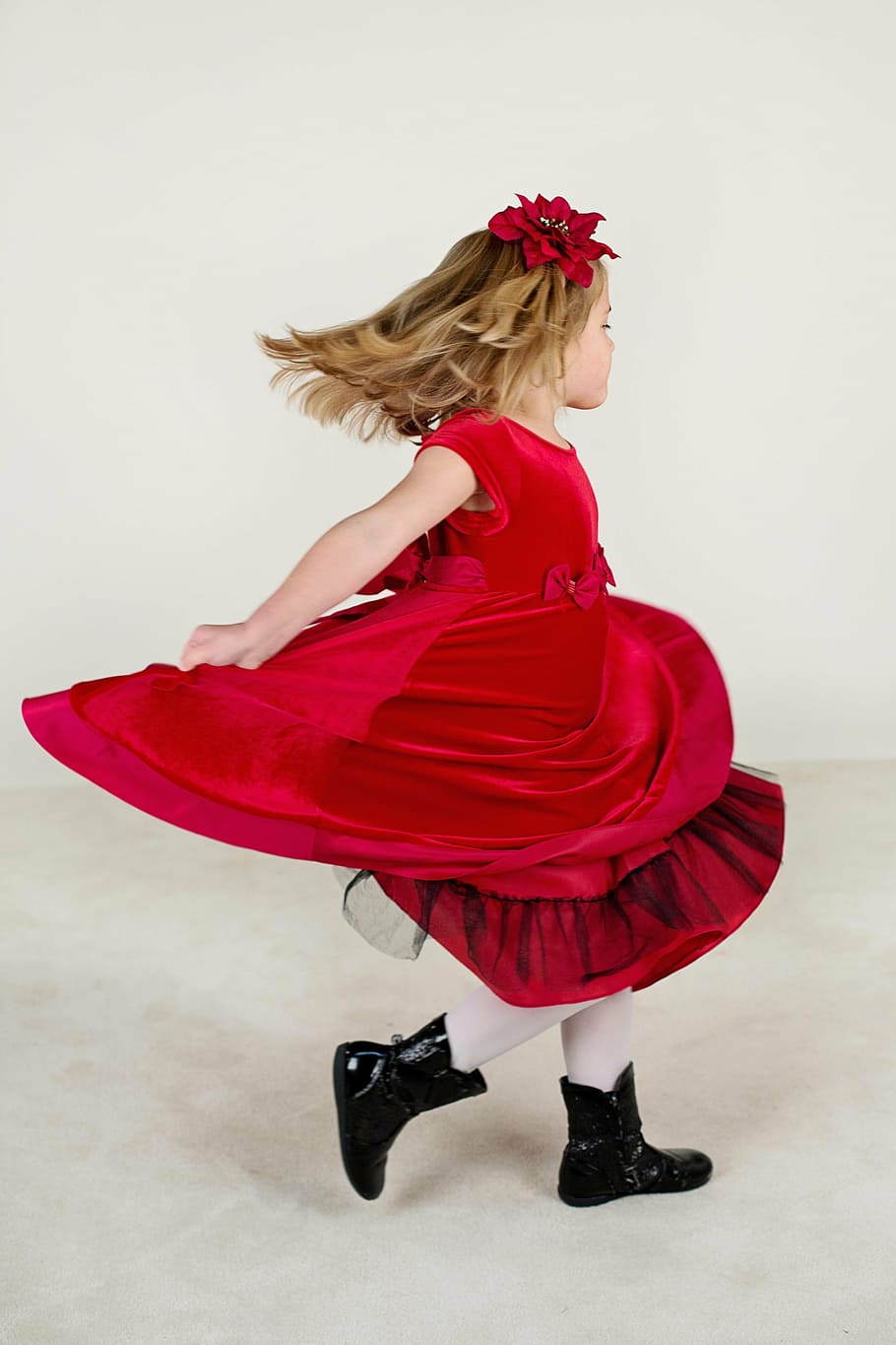 woman in red dress running