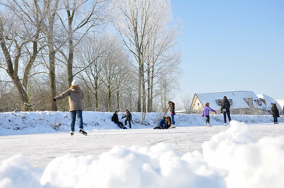 group of people playing on snow, ice skating, winter, netherlands HD wallpaper