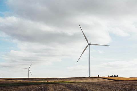 two white windmills on brown field during daytime, white wind turbines HD wallpaper