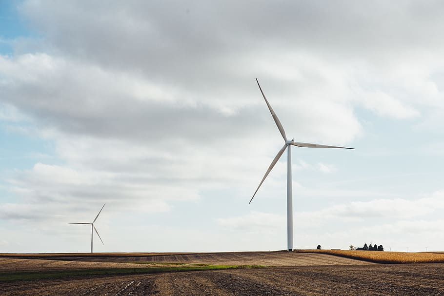 two white windmills on brown field during daytime, white wind turbines HD wallpaper