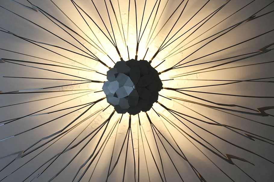 closeup photography of black sunburst metal decor, pattern HD wallpaper