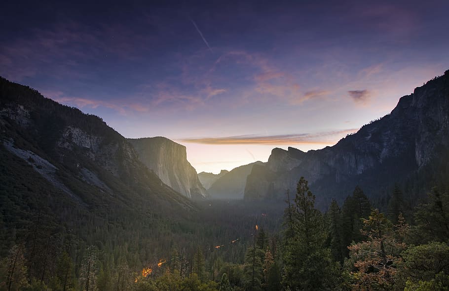 mountain beside tree field, aerial photography of mountain during sunrise HD wallpaper