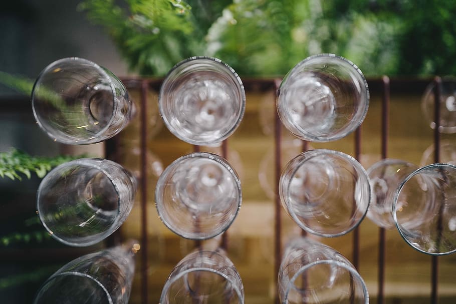 A big bunch of wine glasses hanging from a holder, restaurant HD wallpaper