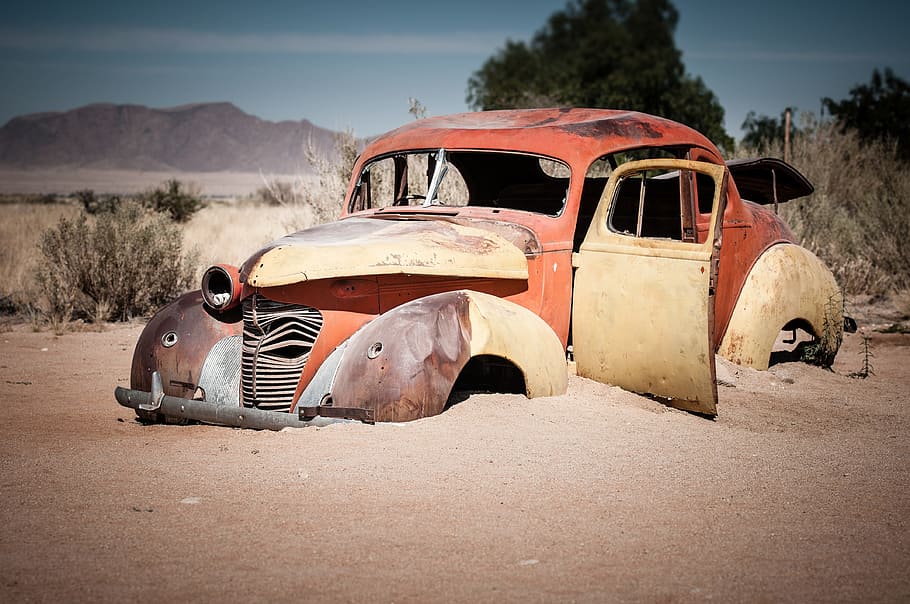 photo of vintage red car on brown sand, africa, namibia, solitaire HD wallpaper
