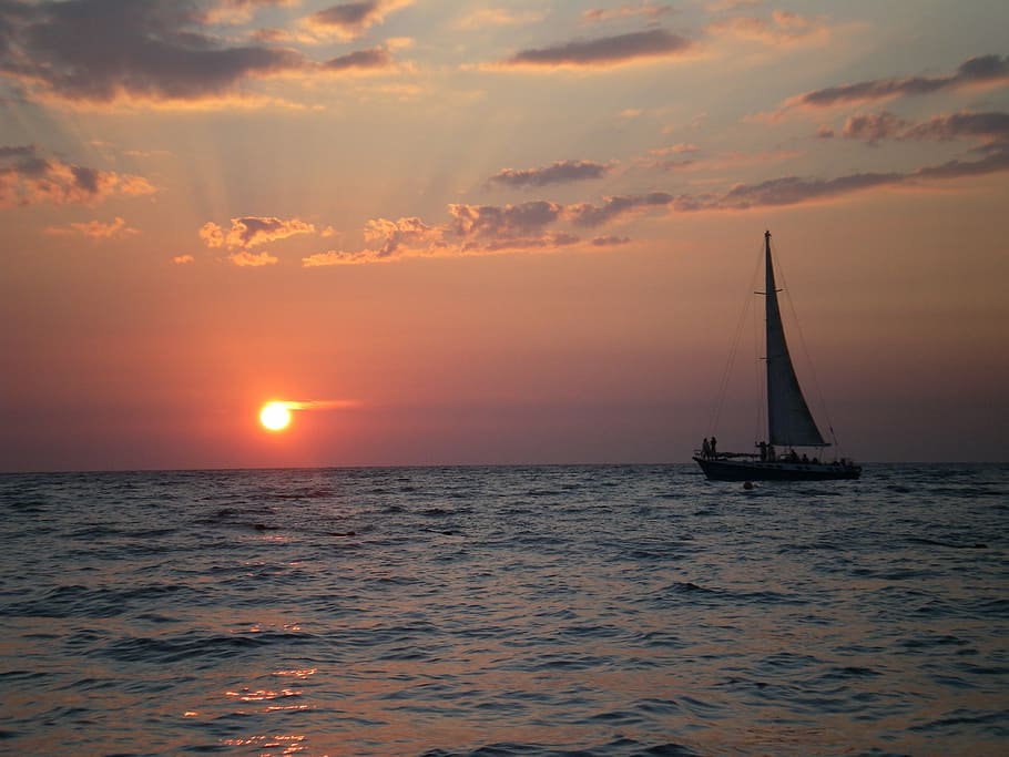 silhouette of sailboat on body of water at sunset, sea, cloud - sky HD wallpaper