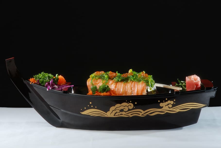 raw meat with leaf platter, sushi boat, lunch, dinner, seafood