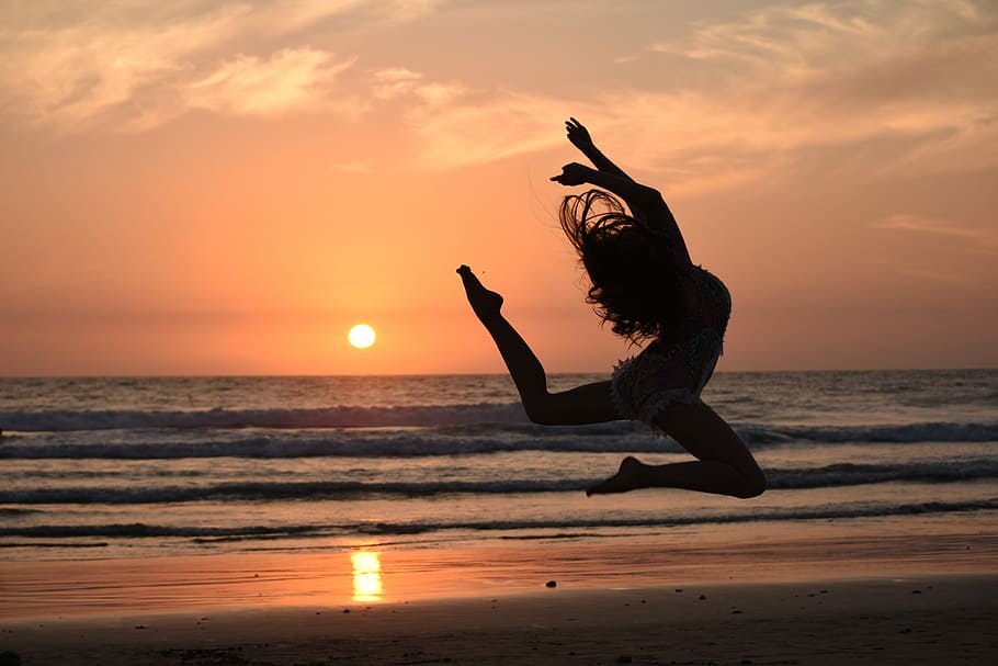 woman jumping near body of water during sunset, dance, silhouette HD wallpaper