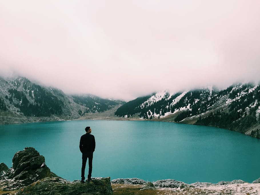 fog, lake, man, mountain, nature, person, trees, view, outdoors HD wallpaper