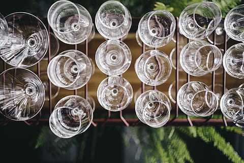A big bunch of wine glasses hanging from a holder, restaurant HD wallpaper