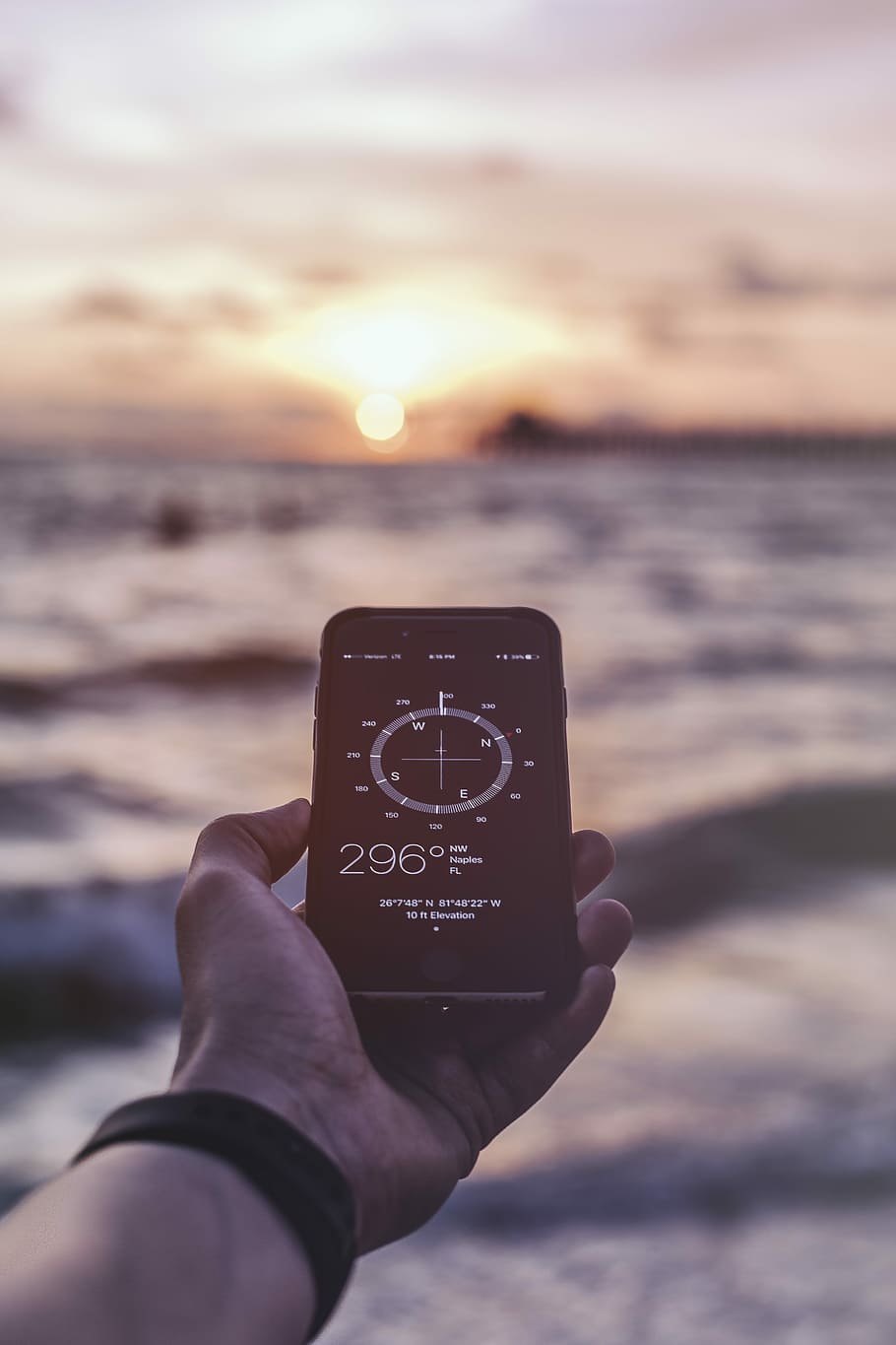 HD wallpaper: person holding smartphone reading at 296, iPhone compass  showing 296 NW | Wallpaper Flare