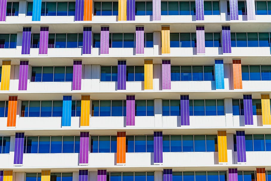 white and multicolored building, white and multicolored concrete building HD wallpaper