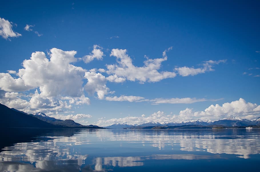calm body of water under blue sky, lake, brightness, reflection HD wallpaper